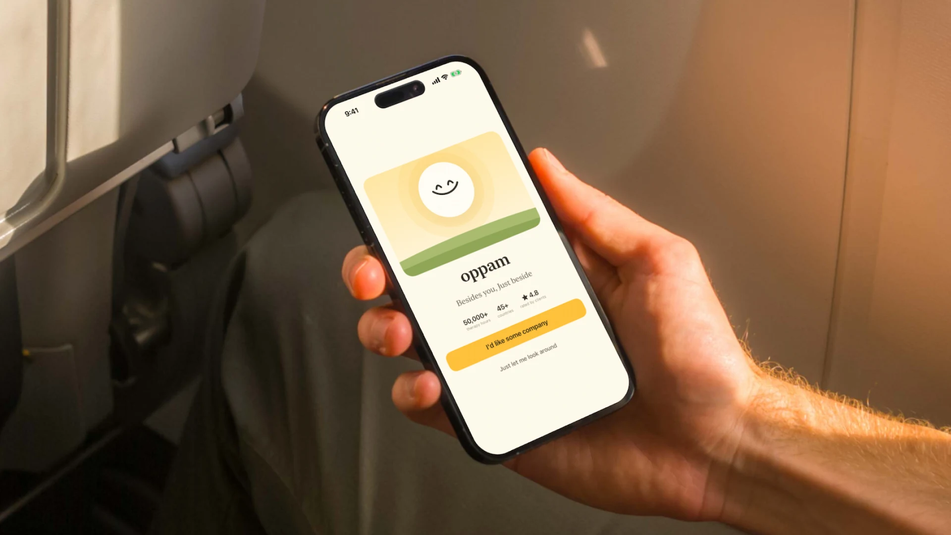 The Oppam app running on a phone held in one hand